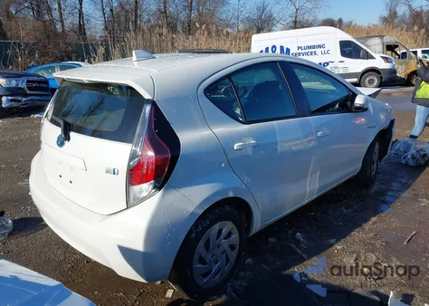 2016 Toyota Prius C Two z USA, uszkodzony, nr VIN JTDKDTB30G1136932